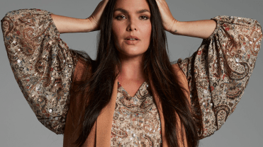 A model poses wearing an outfit frim Dia