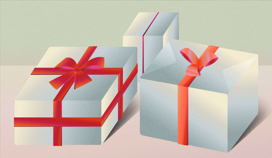 Holiday gifts, wrapped in white paper with a red bow